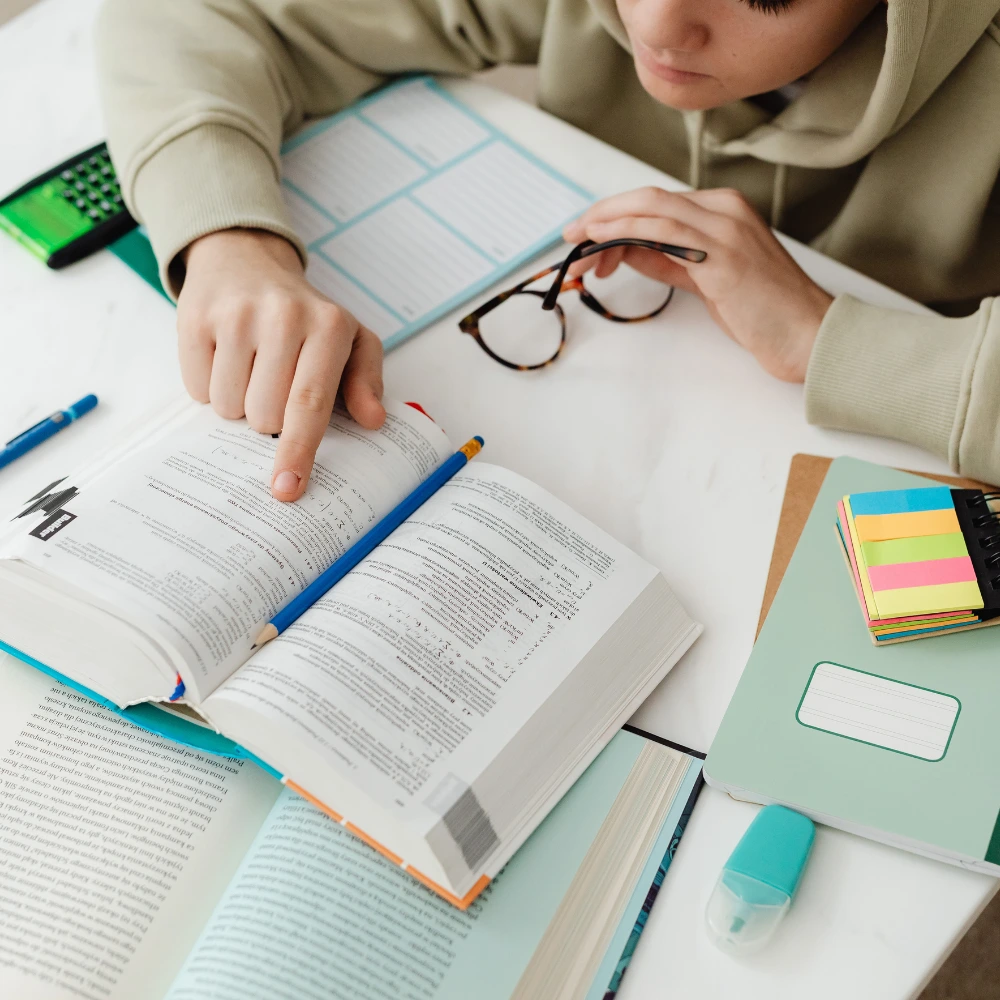 Student solving physics numericals that support the NEET 2026 preparation strategy followed at Annamalayar Educational Trust