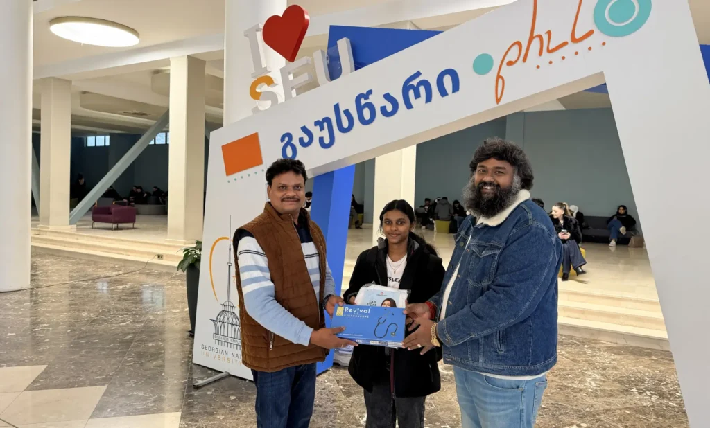 MBBS abroad student admission at Georgian National University SEU with Annamalayar Educational Trust representatives during university campus visit in Georgia.