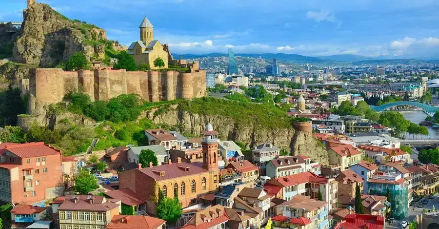 Tbilisi city skyline with modern university campus and Georgian architecture for MBBS study